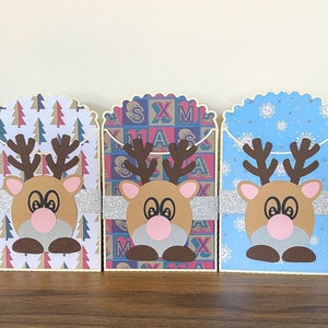 Porte-cartes cadeau renne. Emballage cadeau festif. Porte-monnaie de Noël