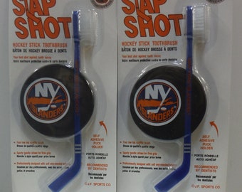 Par de cepillos de dientes Slap-Shot de los New York Islanders de J.F. Sports
