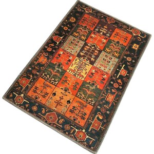 May include: A rectangular area rug featuring a grid of colorful panels in shades of orange, green, yellow, and black. Each panel displays intricate botanical and animal motifs, surrounded by a dark border with repeating geometric patterns.