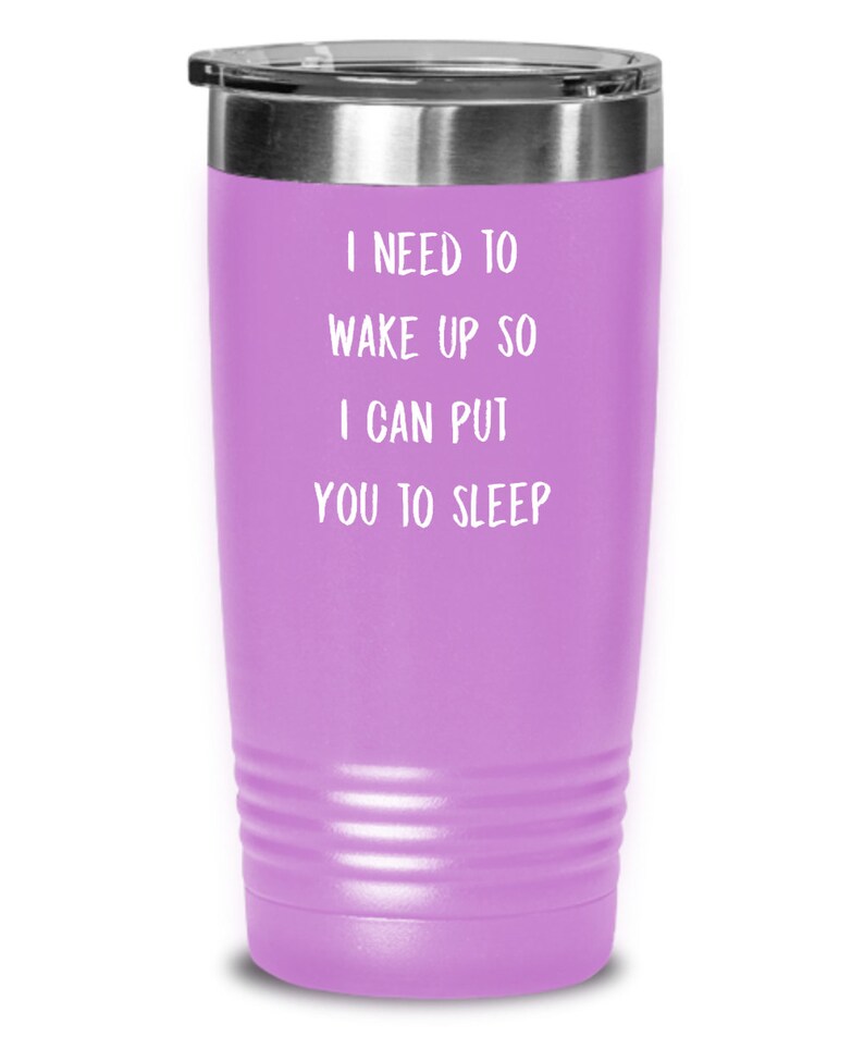 May include: A purple stainless steel tumbler with the text "I need to wake up so I can put you to sleep".