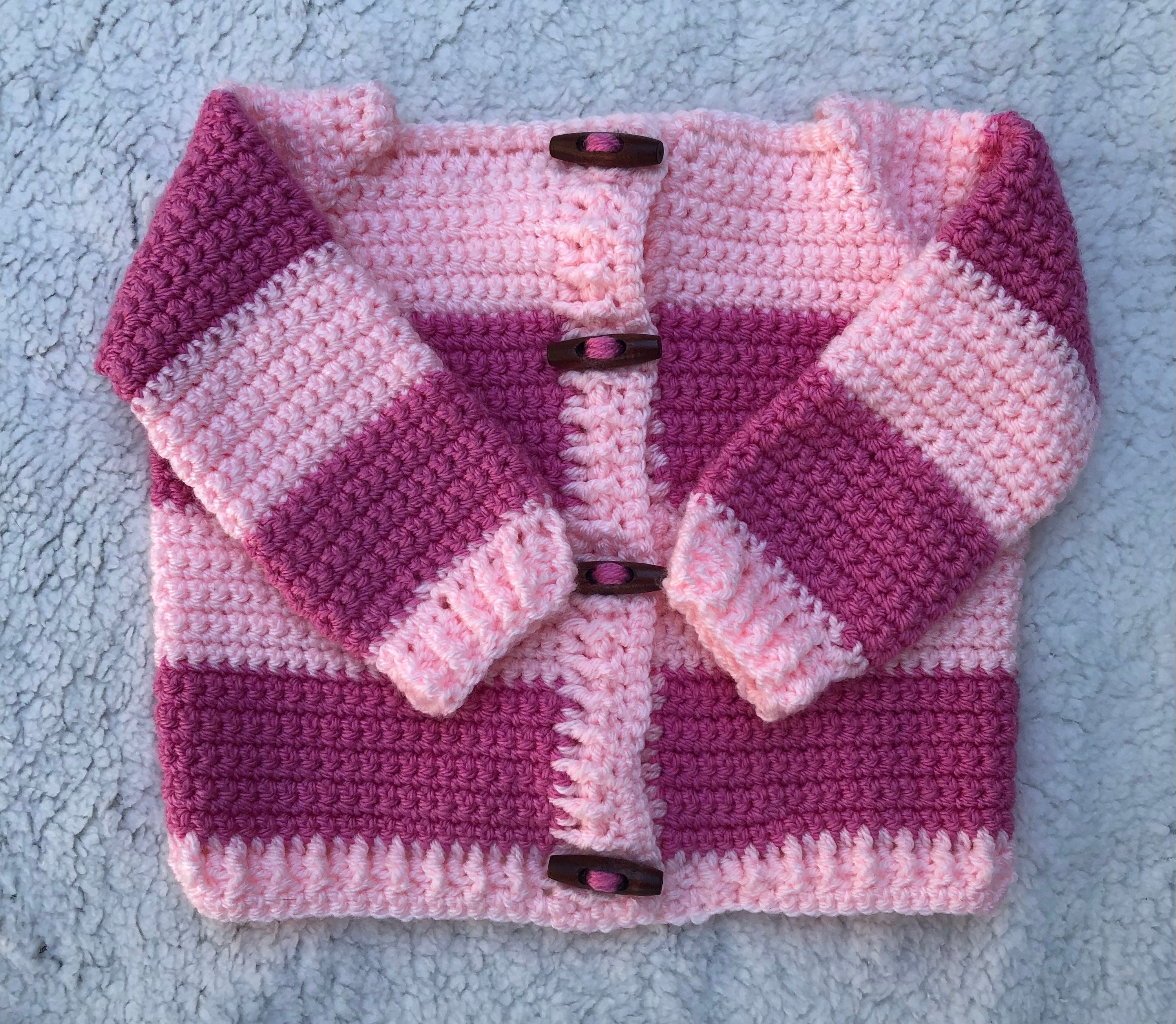 pink white striped sweater