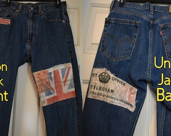 May include: A pair of blue denim jeans with patches on the front and back. The front patch is a Union Jack flag and the back patch is a vintage telegram stamp. The jeans are labeled "Union Jack Front" and "Union Jack Back".