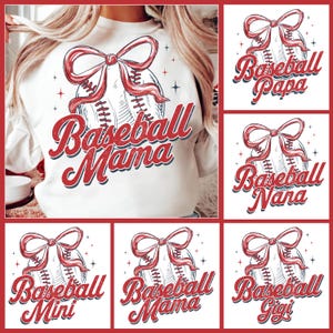 May include: A white sweatshirt with a red baseball and bow design. The text "Baseball Mama" is written in red and blue letters.