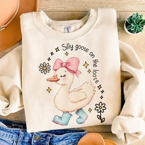 Silly goose on the loose PNG sublimation file, DTX DTG transfer Diy craft for T-shirt design, mug, sticker, card, Silly goose girl big bow