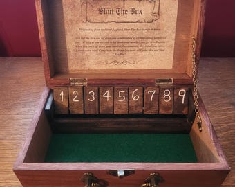 Jeu de fermeture fait main en bois avec dés