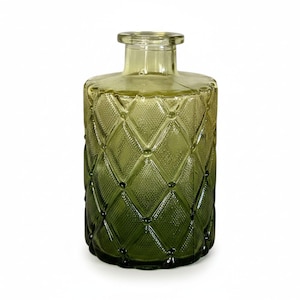 May include: A cylindrical glass bottle in a deep olive green hue, featuring a textured diamond pattern across its body. The bottle has a narrow neck with a thick, rounded rim at the top, and the glass surface displays a subtle gradient effect.