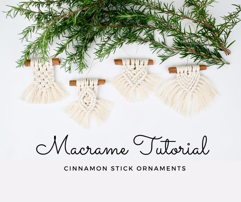 May include: Five small macrame ornaments hanging from cinnamon sticks. The ornaments are white and have a fringe at the bottom. The ornaments are arranged in a row on a white background. The text "Macrame Tutorial Cinnamon Stick Ornaments" is below the ornaments.
