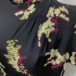 Vintage 1940s rayon dress novelty print cherry blossom trees black lime pink hip swag short sleeved black with lovely design midi
