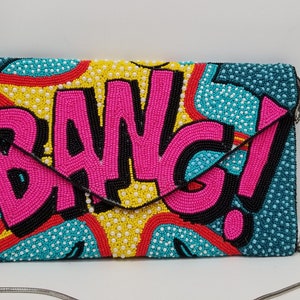 CLUTCH DE CUENTAS POP ART