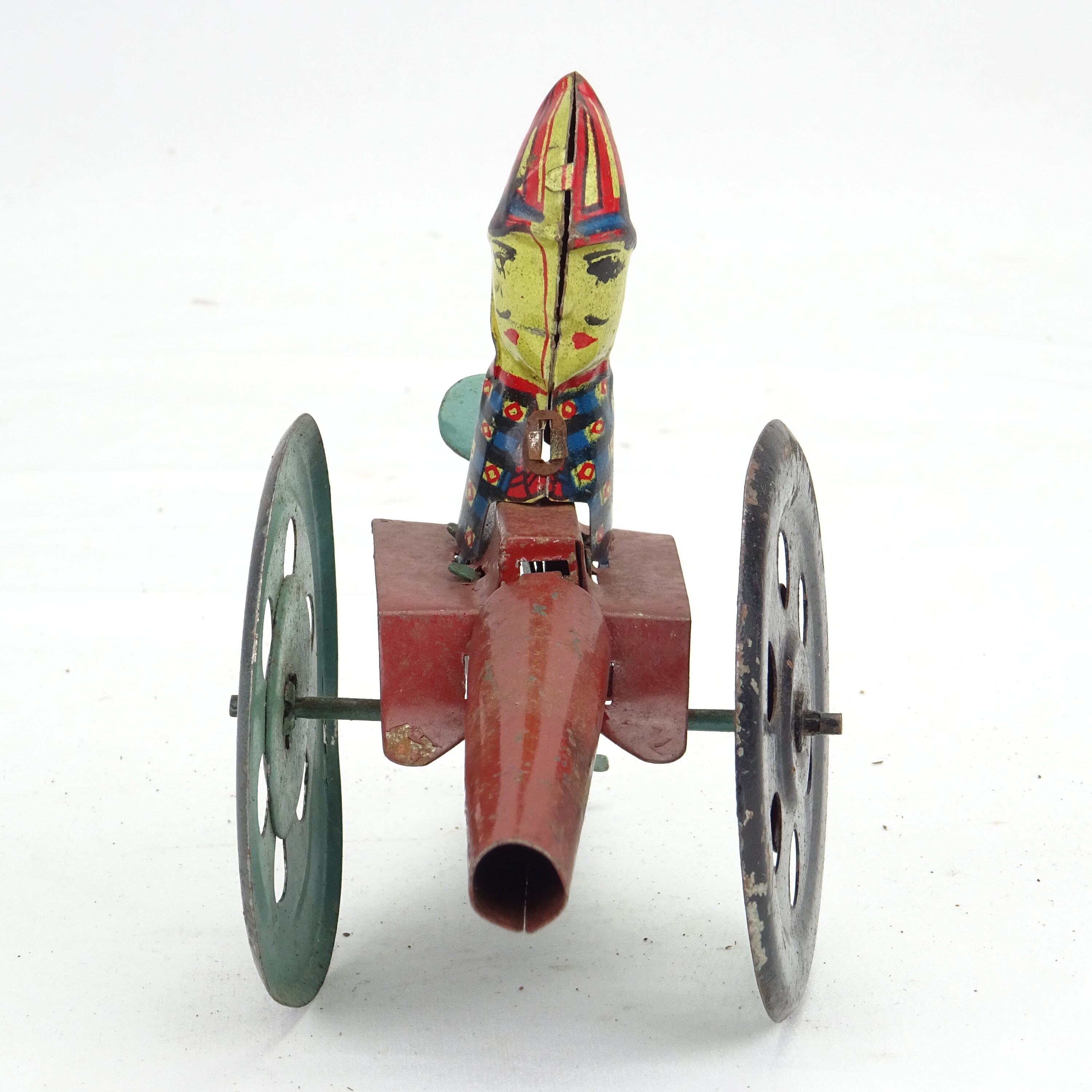 Ancien jouet mécanique 1930 en tôle lithographiée à ressort