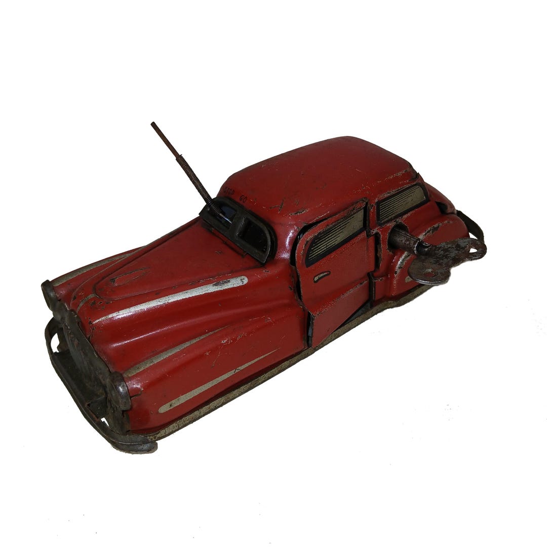 Jouet tôle ancien Auto Miracle 2002 voiture mécanique 1959