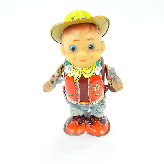 Antiguo juguete japon s de chapa Nomura aut mata vaquero
