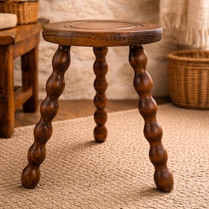 May include: A set of three ceramic mugs with a speckled, matte finish. The mugs are in shades of cream, light gray, and dark gray. Each mug has a simple, minimalist design, perfect for coffee or tea.