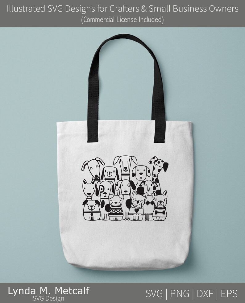 May include: A white tote bag with black handles and a black and white illustration of a group of dogs on the front. The illustration includes a variety of dog breeds, including a dalmatian, a pug, a bulldog, and a terrier. The text "Lynda M. Metcalf SVG Design" is printed below the illustration.