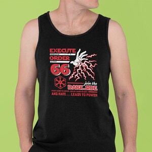 May include: Black tank top with a red graphic print of a hand with lightning bolts and the text "EXECUTE ORDER 66 join the DARK SIDE FEAR LEADS TO ANGER, ANGER LEADS TO HATE AND HATE... LEADS TO POWER"