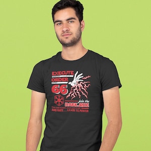 May include: Black t-shirt with a graphic print of a hand with lightning bolts and the text "EXECUTE ORDER 66" and "join the DARK SIDE FEAR LEADS TO ANGER, ANGER LEADS TO HATE... AND HATE... LEADS TO POWER".
