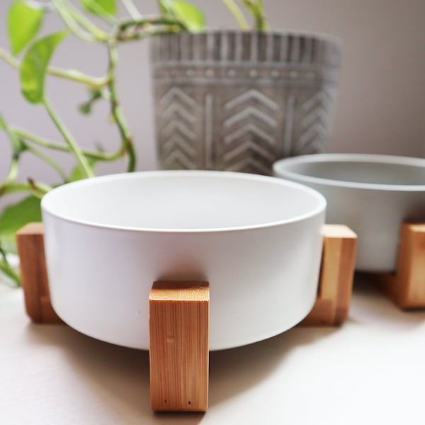 Ceramic bowls for pets with a bamboo stand