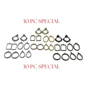 May include: A set of 30 silver, gold, and black metal pendant frames. The frames are in various shapes, including circles, ovals, and rectangles. The frames are arranged in three rows, with 10 frames in each row. The text "30 PC SPECIAL" appears twice in the image.