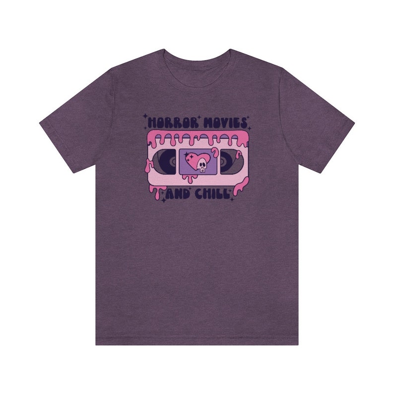 Horror movies and chill tshirt, Halloween tshirt, Pink Halloween shirt,Girly Halloween, Retro Groovy shirt, Scary movie tee, Spooky shirt Heather Team Purple