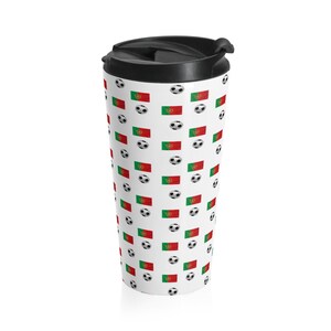 May include: White travel mug with a repeating pattern of soccer balls and the Portuguese flag.