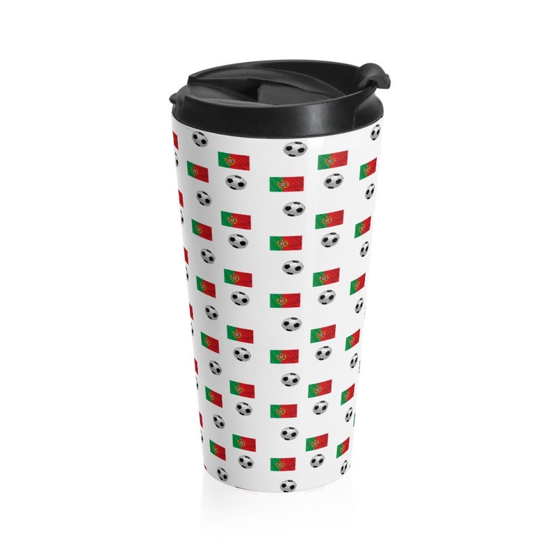 May include: White travel mug with a repeating pattern of soccer balls and the Portuguese flag.