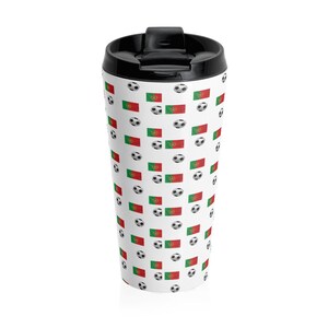 May include: White travel mug with a repeating pattern of soccer balls and the Portuguese flag.