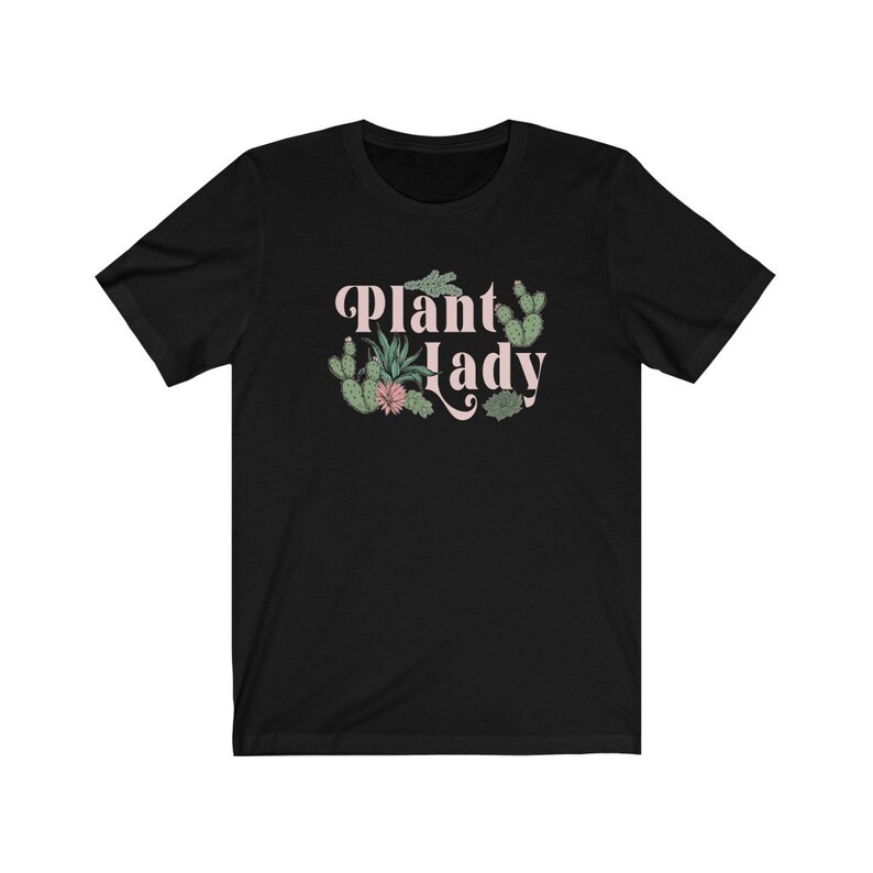 May include: Black t-shirt with the text "Plant Lady" in pink lettering and a graphic of various cacti and succulents.