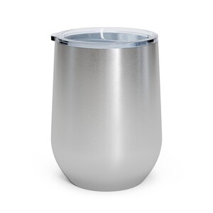 May include: A stainless steel wine tumbler with a clear lid. The tumbler has a brushed finish and is designed to keep drinks cold or hot.