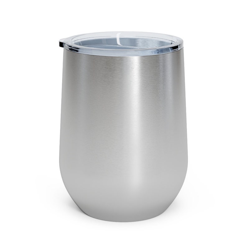 May include: A stainless steel wine tumbler with a clear lid. The tumbler has a brushed finish and is designed to keep drinks cold or hot.