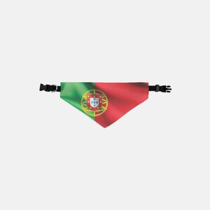 May include: A triangular pet bandana featuring the flag of Portugal. The bandana is green and red with the Portuguese coat of arms in the center. It has a black adjustable collar with a buckle.