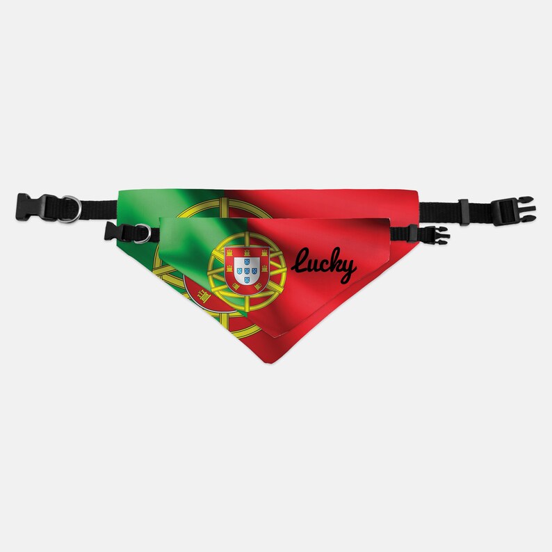May include: A dog bandana featuring the Portuguese flag design in red and green, with the word "Lucky" in black script. The bandana has a black adjustable collar with a plastic buckle.