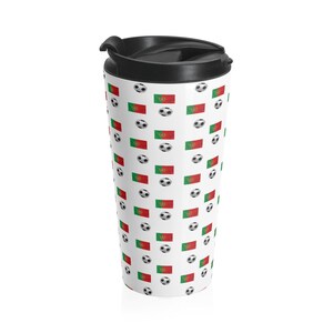 May include: A white travel mug with a black lid and a repeating pattern of the Portuguese flag and soccer balls.