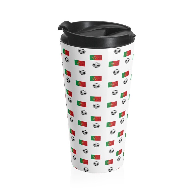 May include: A white travel mug with a black lid and a repeating pattern of the Portuguese flag and soccer balls.