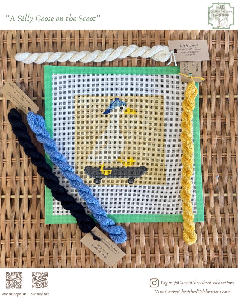 May include: Needlepoint canvas featuring a goose on a skateboard, with the text "A Silly Goose on the Scoot." The canvas is surrounded by green fabric and includes skeins of black, blue, and yellow embroidery floss. The background is a woven texture.