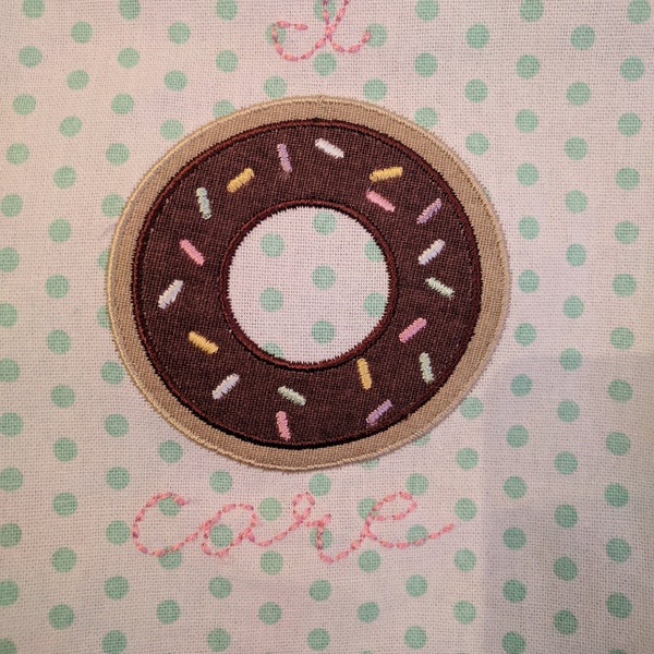 Appliqued Donut with Sprinkles 100% Cotton Tea Towel repurposed into a lovely Apron with grosgrain ribbon ties. OOAK, Makes a lovely gift!