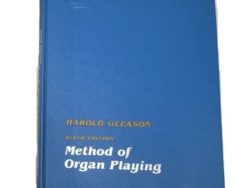 May include: A blue hardcover book titled Method of Organ Playing, Sixth Edition by Harold Gleason. The front cover features gold lettering for the author's name and white lettering for the title and edition, with the text also on the spine.