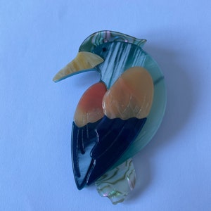 Stunning vintage style layered lucite bird brooch.