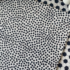 Black and white spots. Cork backed leather 8x10”