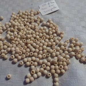lot of 300 very old bovine bone beads diameter 7 mm