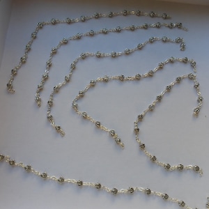 lot of 6 lengths of 23.5 cm of metal rosebud beads mounted unremovable