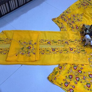 CHINON WITH EMBROIDERY SEQUENCE CODDING DESIGN WORK WITH CANCAN AND CANVAS LEHENGA CHOLI