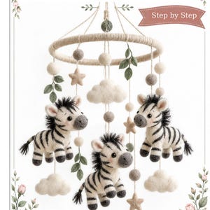 May include: A needle-felted mobile featuring three zebra figures, felt clouds, stars, and green leaves hanging from a circular frame. The text reads: Zebras - Needle-Felted Mobile, Step by Step, and 10 pages of pictures and instructions.