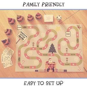 May include: A handmade Christmas-themed board game with a green and pink game board, a Santa Claus illustration, and the text "Santa's Little Helper". The game includes a die, elf figurines, and game cards.