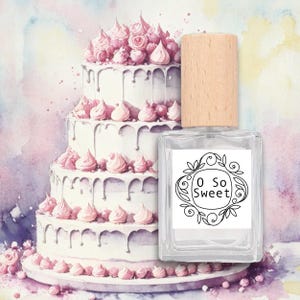 May include: A clear, rectangular perfume bottle with a wooden cap, labelled "O So Sweet" in a decorative frame. A watercolour painting of a three-tiered cake with pink frosting and decorations is in the background.