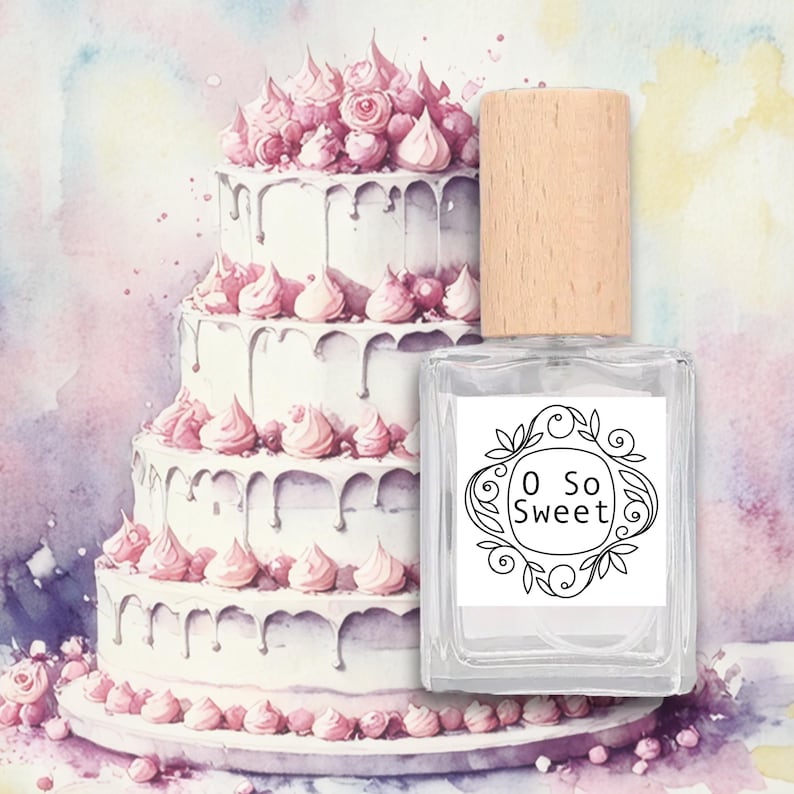 May include: A clear, rectangular perfume bottle with a wooden cap, labelled "O So Sweet" in a decorative frame. A watercolour painting of a three-tiered cake with pink frosting and decorations is in the background.