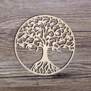 May include: A wooden cutout of a tree of life with intricate branches and roots. The tree is circular and has a light brown colour.