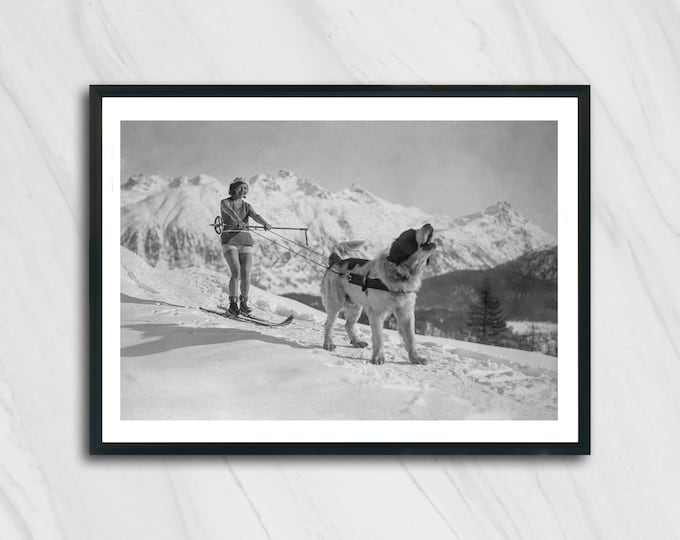 Featured listing image: Femme à ski tirée par un Saint-Bernard