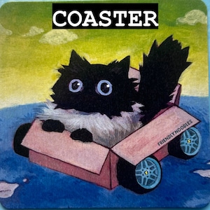 May include: A black and white cat with blue eyes sits in a cardboard box with wheels. The box is pink and has the words "FRIENDLY NOODLES" printed on the side. The cat is looking at the viewer. The background is a blue and green watercolor wash.