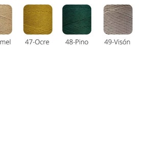 May include: Four spools of yarn in different colors: camel, ochre, pine green, and light gray. Each spool is labeled with a number and color name.