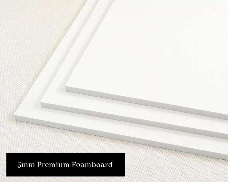 May include: Three white foam boards stacked on top of each other. The top board is the largest, and the bottom board is the smallest. The boards are 5mm thick. 5mm Premium Foamboard.